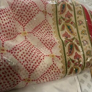 Saree red  cream in bandhani pattern. Zari multi color thread work. New